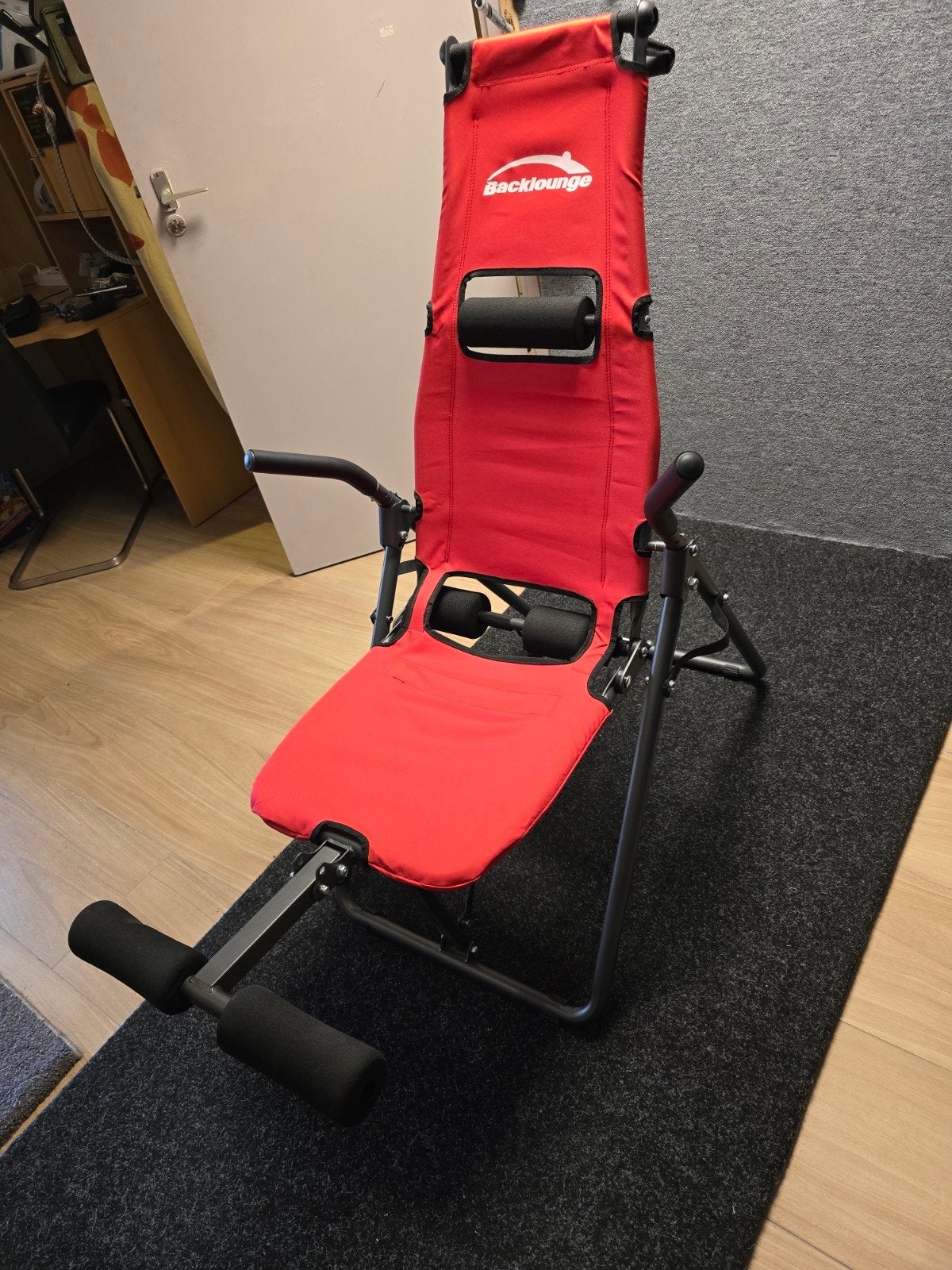 backlounger rugtrainer, Ophalen, Rug
