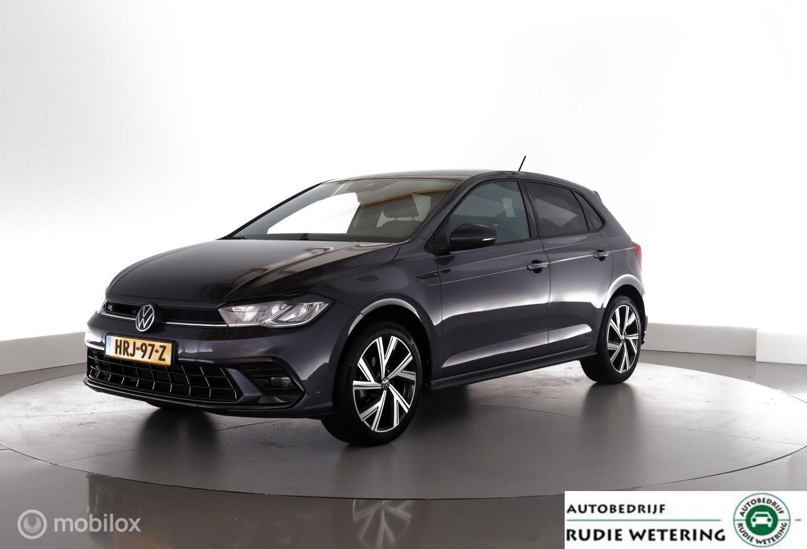 Volkswagen Polo 1.0 TSI Automaat R-Line stoelverw.|cam|virtu, Stof, Gebruikt, Zwart, Met garantie (alle)