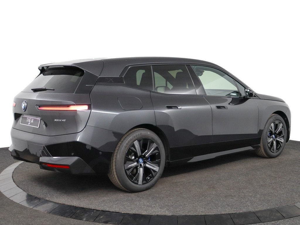 BMW iX xDrive40 | Sport Package | Panoramadak | Harman/Kardo, Auto's, Stof, Gebruikt, Met garantie (alle), Origineel Nederlands
