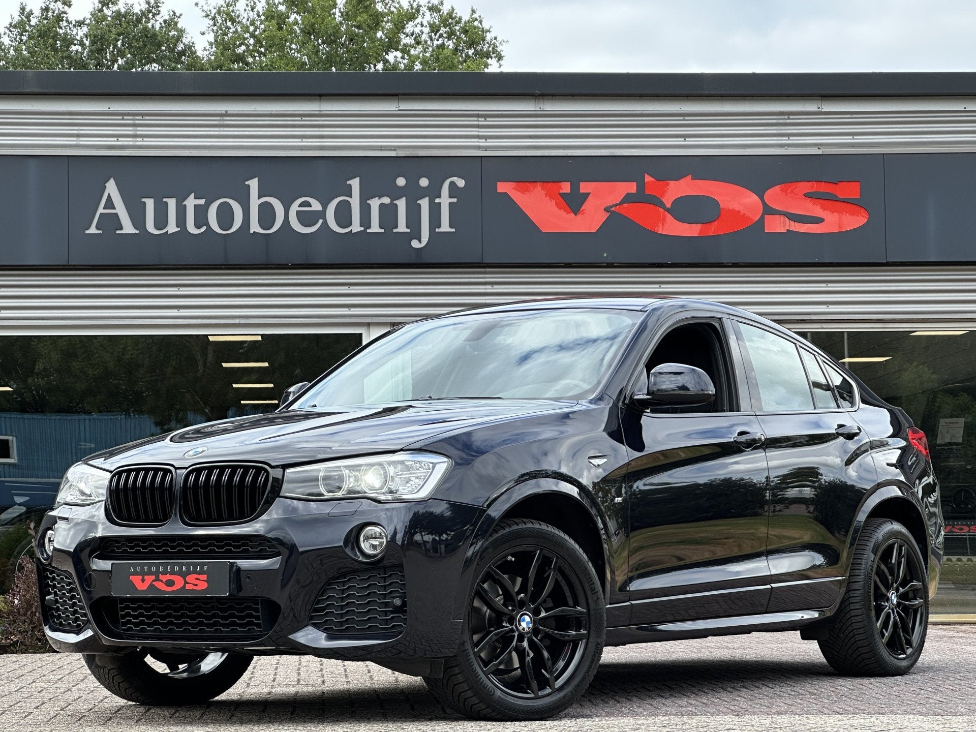 BMW X4 xDrive20i M Sport | Camera | Trekhaak | Navi | Leder, Auto's, Automaat, Gebruikt, Zwart, Bedrijf