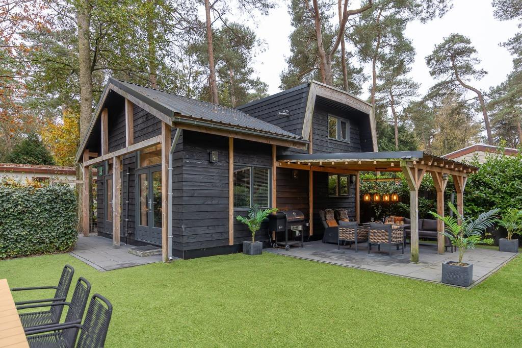 Vakantie woning Everzwijn (Veluwe), In bos, Recreatiepark, Open haard, Gelderland en Veluwe