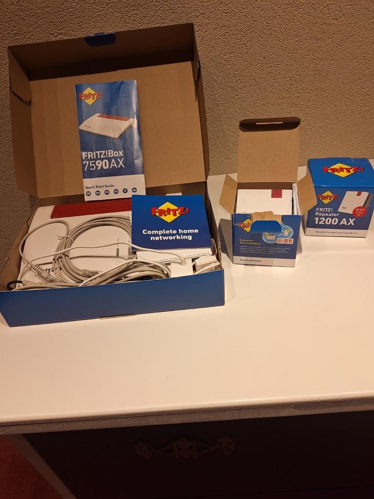 FRITZ!Box 7590 AX + 2x FRITZ!Repeater 1200 AX - Nieuw, Computers en Software, Routers en Modems, Nieuw, Router met modem, Ophalen of Verzenden