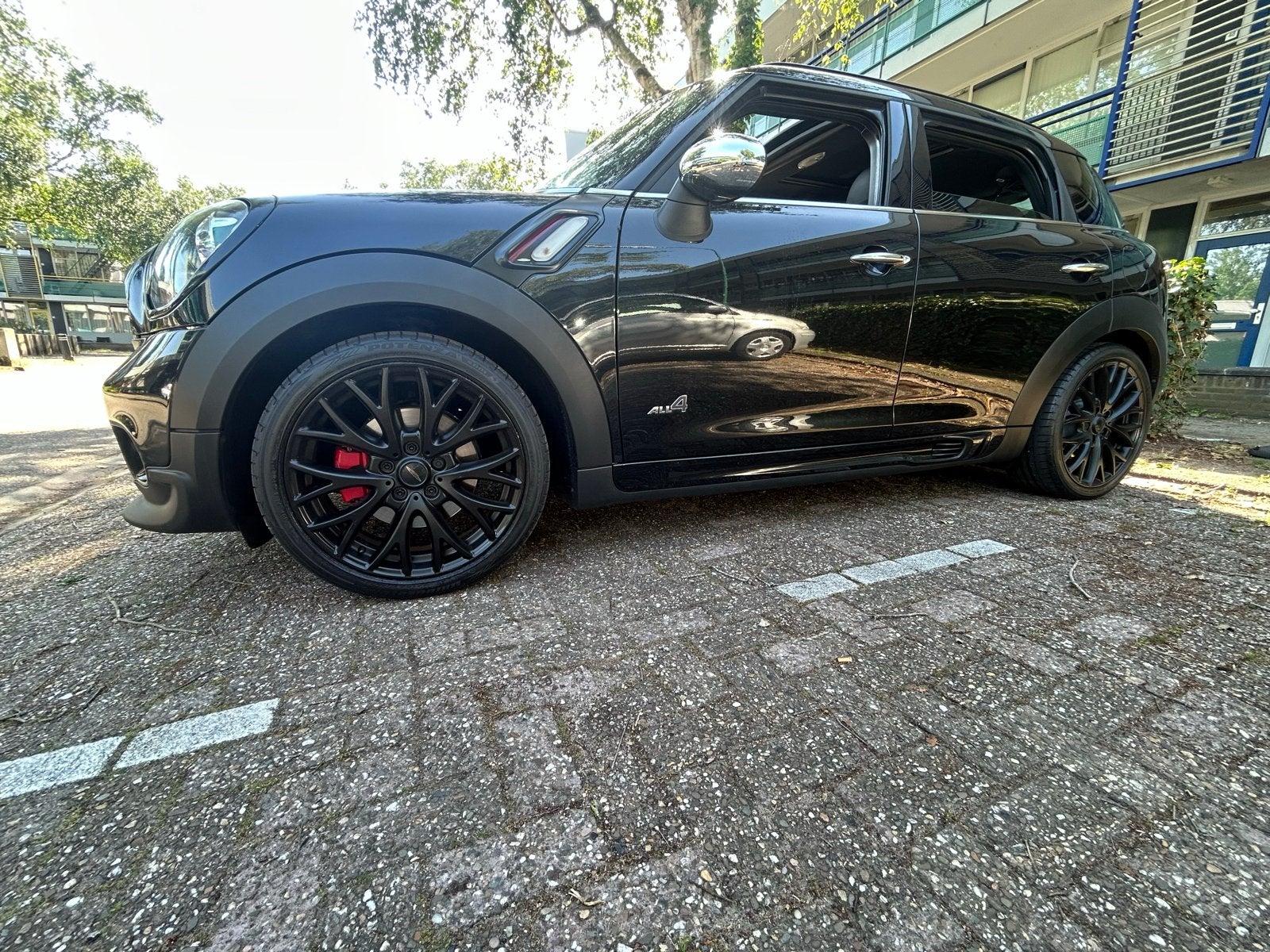 Mini Countryman 1.6 John Cooper Works AUT 2013 Zwart, Auto's, Mini, Zwart, 75 €/maand, Vierwielaandrijving, Particulier