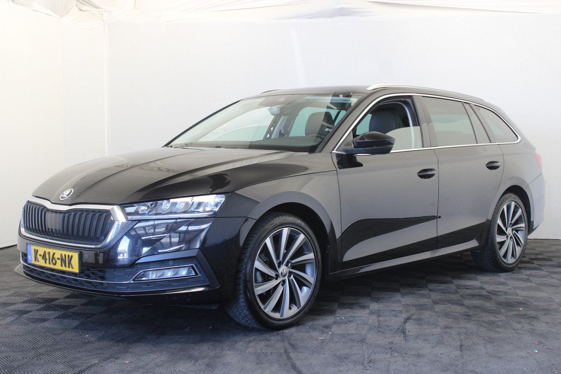 Skoda Octavia Combi 1.0 TSI Business Edition Plus |Navi|Trek, Auto's, Skoda, Gebruikt, Leder en Stof, Zwart, 3 cilinders