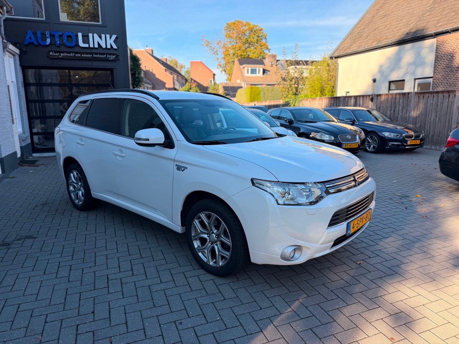 Mitsubishi Outlander 2.0 PHEV | LEER | DAKJE | TREKHAAK | ST, Auto's, Zwart, 4 cilinders, Wit, Vierwielaandrijving