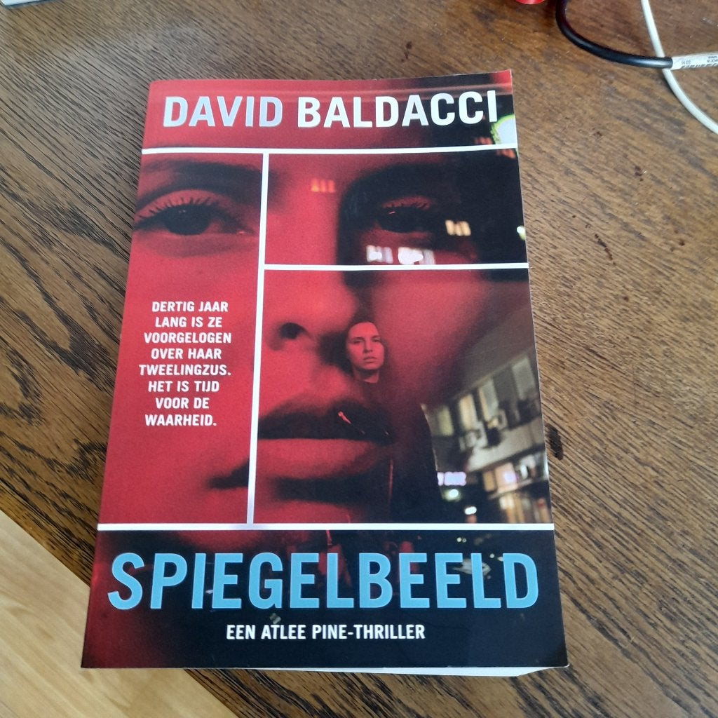David Baldacci - Spiegelbeeld, Ophalen of Verzenden, Zo goed als nieuw, David Baldacci, Wereld overig