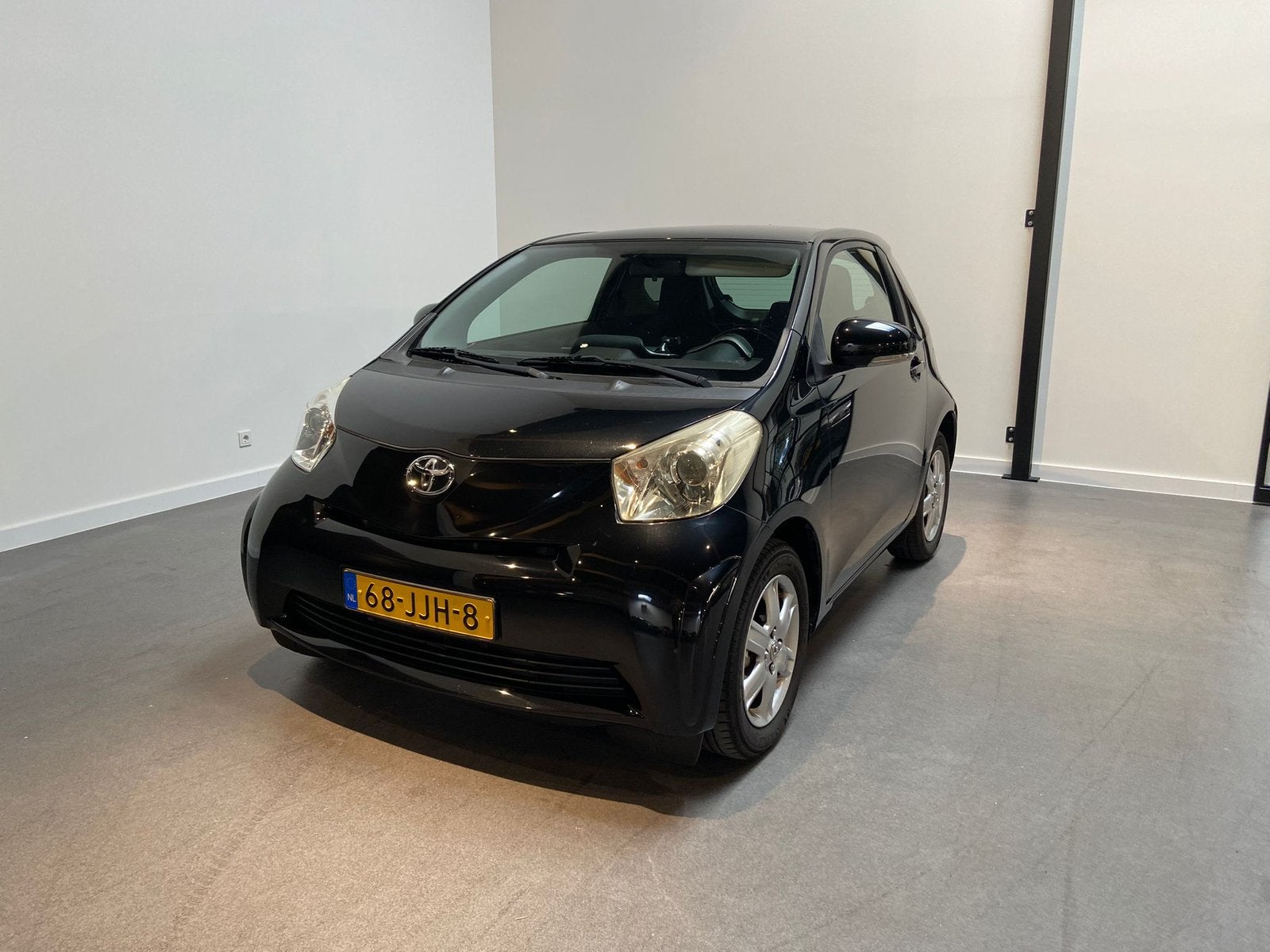 Toyota IQ 1.0 2009 Zwart, Stof, 4 stoelen, Origineel Nederlands, Bruin