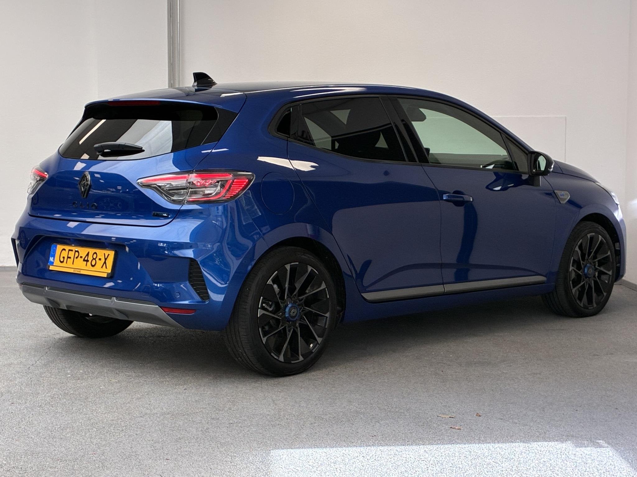 Renault Clio 1.6 E-Tech Full Hybrid 145 esprit Alpine | BOSE, Auto's, Gebruikt, Euro 6, Blauw, Leder en Stof
