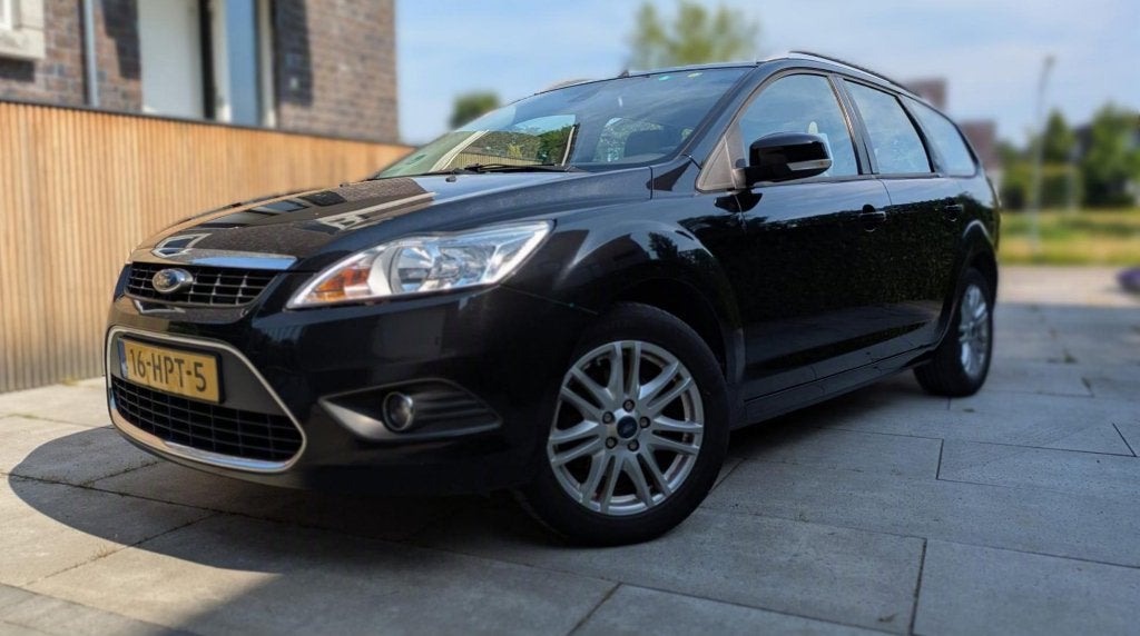 Ford Focus 1.6 16V 100PK 2009 Zwart, Auto's, Ford, 1596 cc, 15 km/l, Beige, 4 cilinders