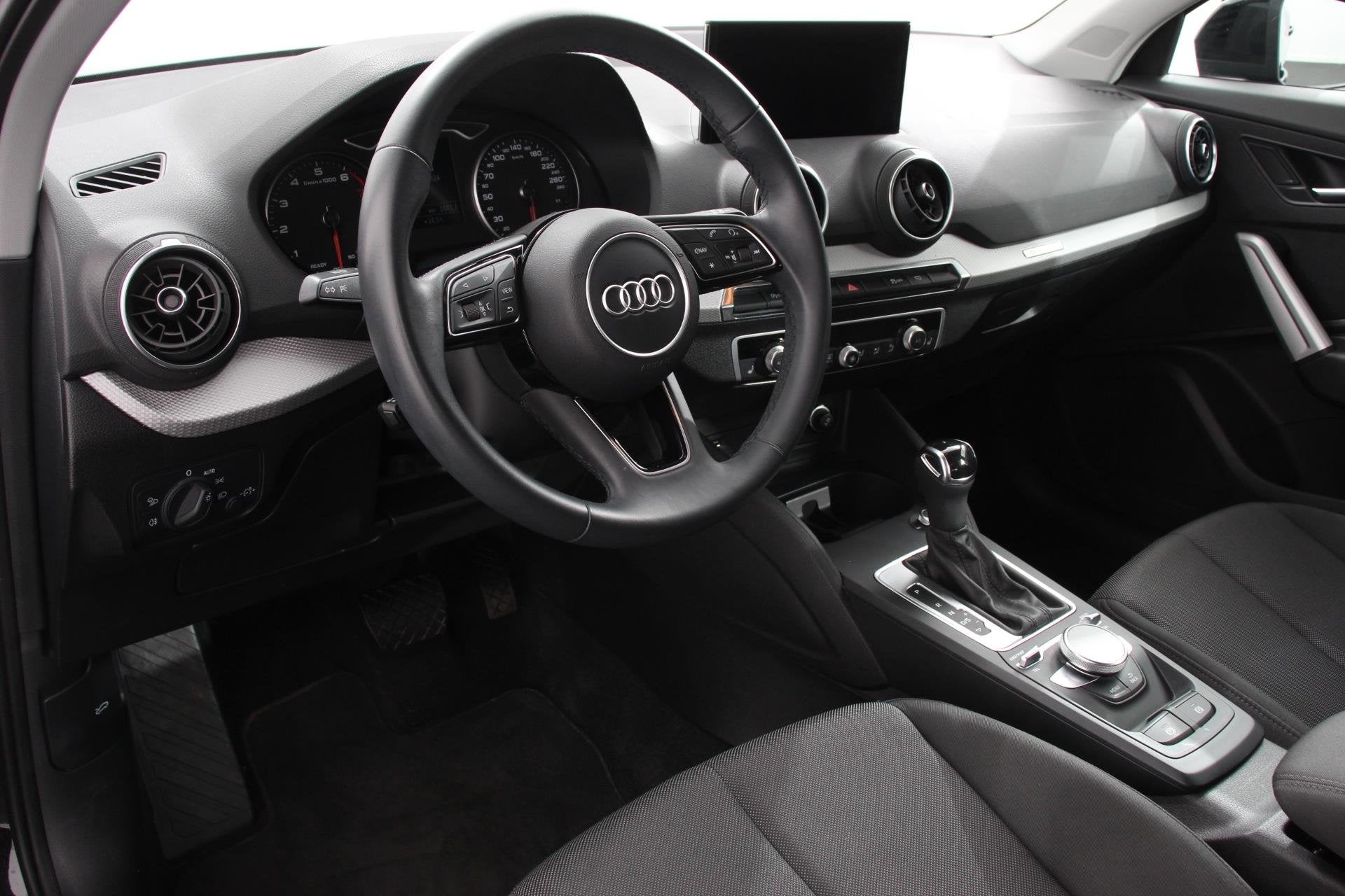 Audi Q2 35 TFSI 150pk S-Tronic Prestige Navigatie Apple Carp, Stof, 4 cilinders, 150 pk, Zwart