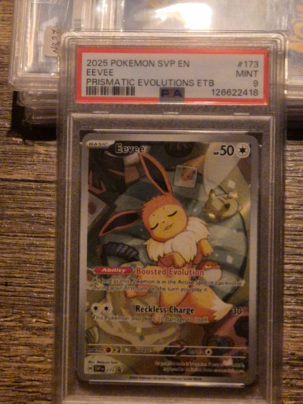 PSA 9 Eevee Prismatic Evolutions ETB Promo Mint, Ophalen of Verzenden, Zo goed als nieuw, Losse kaart, Foil