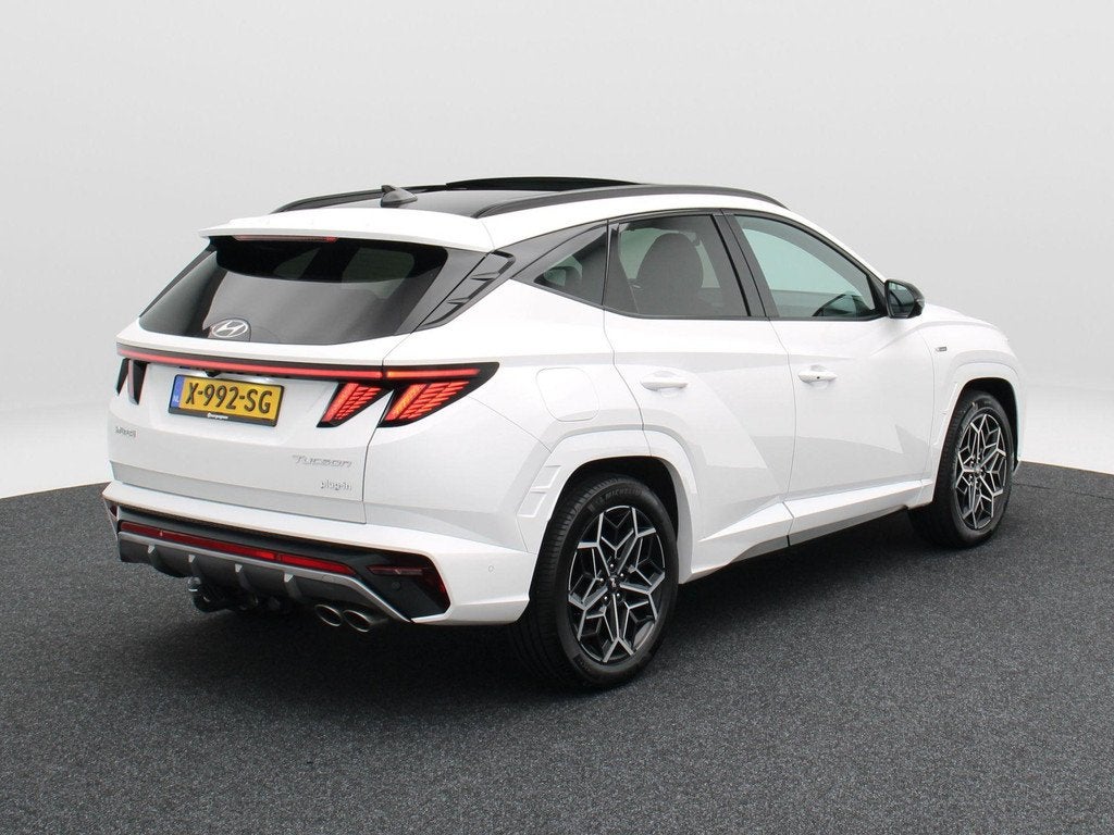 Hyundai Tucson 1.6 T-GDi 265 Pk PHEV Premium Sky 4WD | Stoel, Auto's, Hyundai, 1350 kg, 14 kWh, Gebruikt, Euro 6