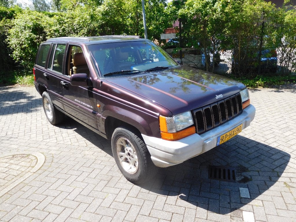 Jeep Grand Cherokee 5.2 I V8 Limited AUT 1997 Bruin, Automaat, 5216 cc, Stoelverwarming, Bruin