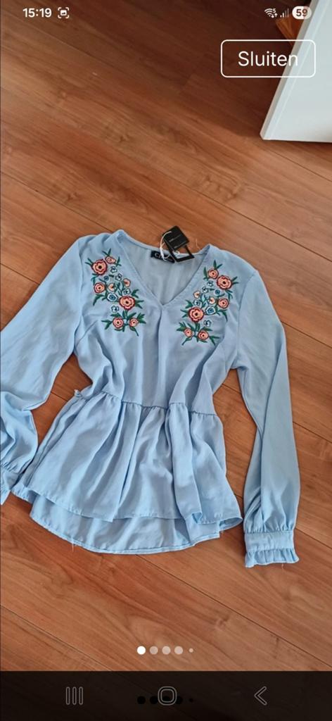 Nieuwe lichtblauwe blouse met bloemen borduurwerk, maat M, Maat 38/40 (M), Blauw, Nieuw, Ophalen of Verzenden