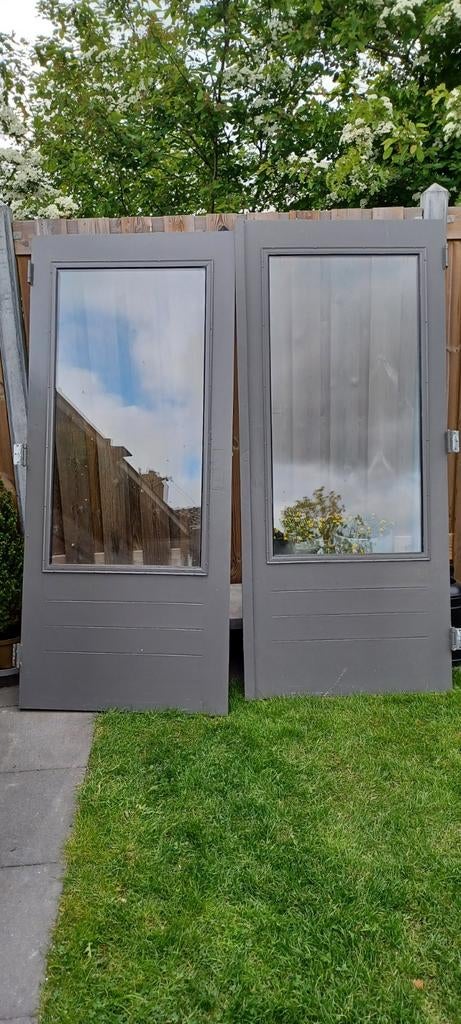 Twee zware hardhouten tuindeuren met thermopane glas., Gebruikt, Ophalen of Verzenden, 200 tot 215 cm, Glas