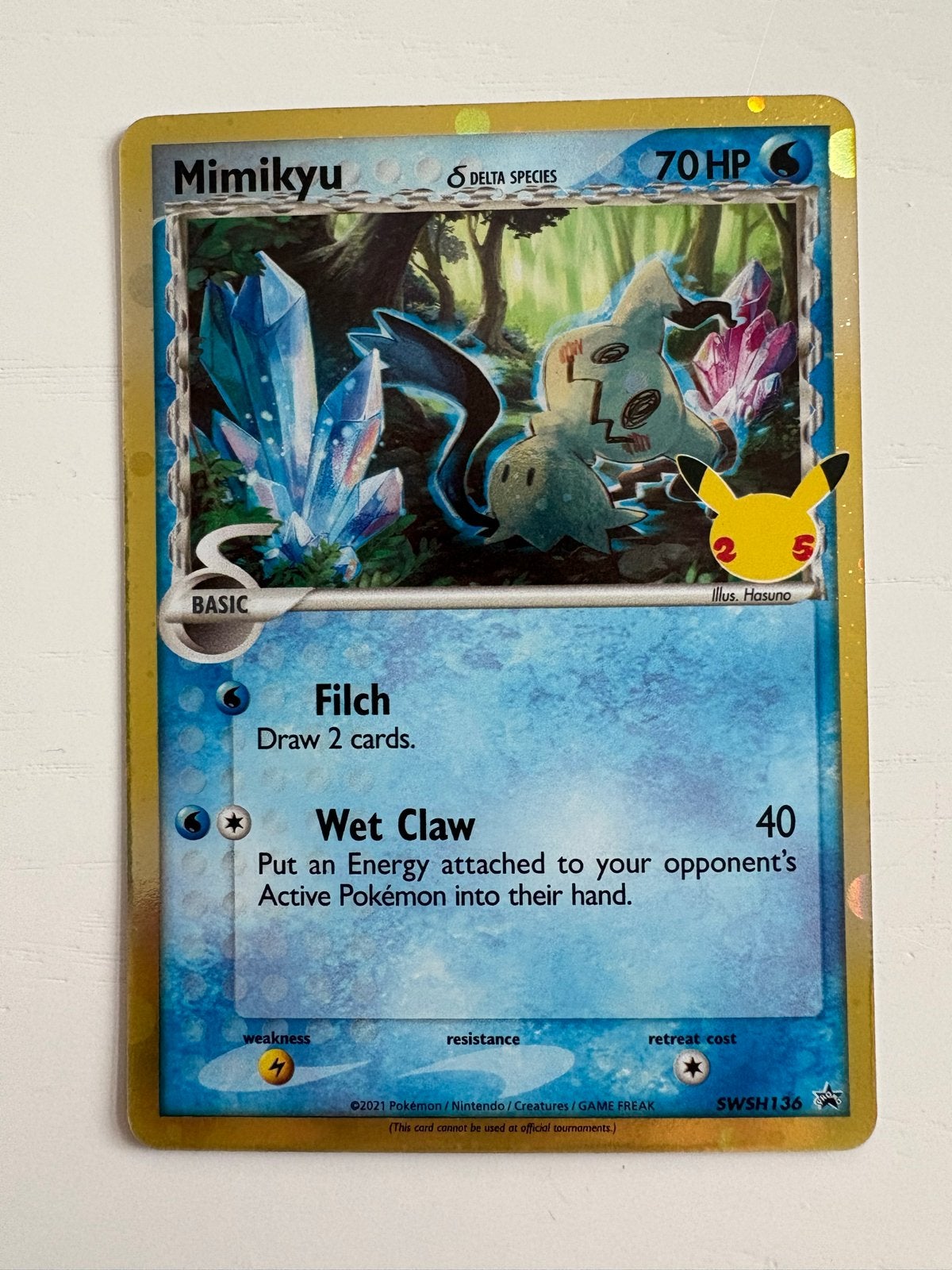Mimikyu SWSH136 Celebrations Pokémon Kaart, Hobby en Vrije tijd, Ophalen of Verzenden, Nieuw, Losse kaart
