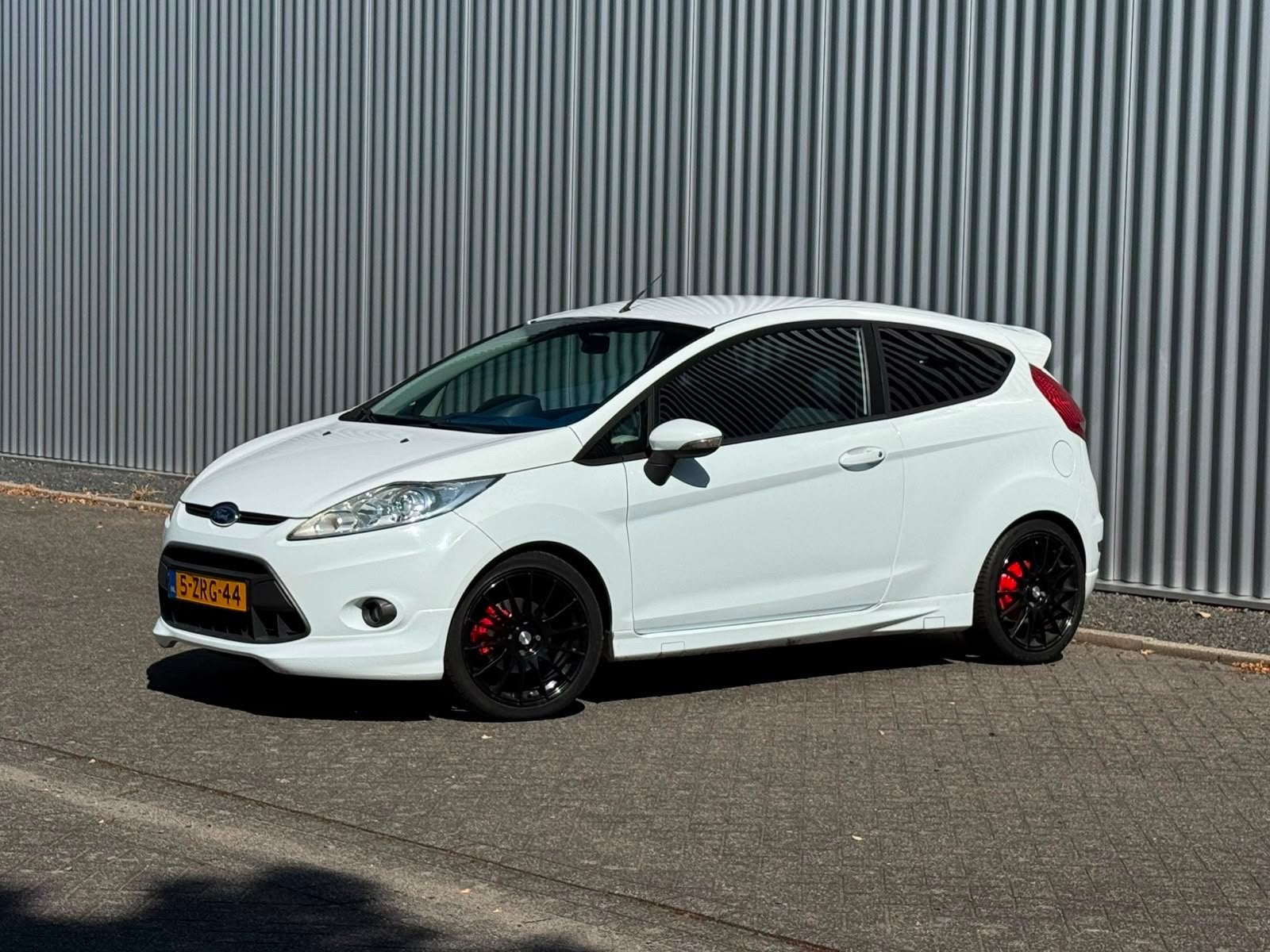 Ford Fiësta 1.6i sportversie 2010, Auto's, 1596 cc, 4 cilinders, Overige bekleding, Wit