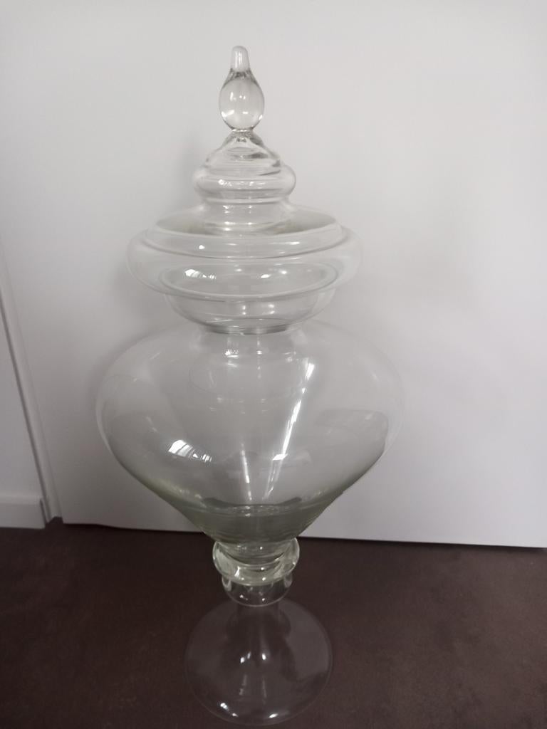 Te koop glazen pot., Ophalen