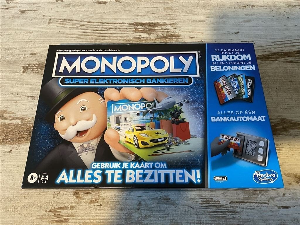 Monopoly super elektronisch bankieren [s648], Hobby en Vrije tijd, Verzenden, Zo goed als nieuw