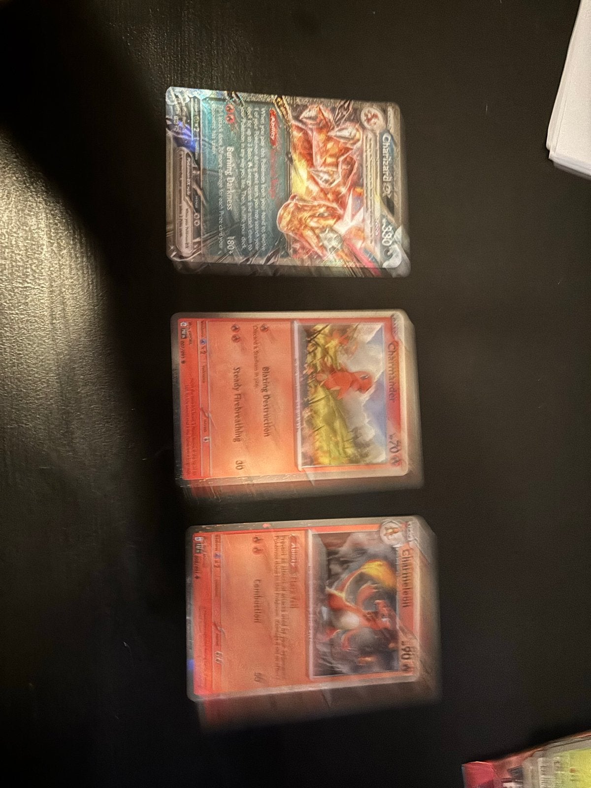 Pokémon Kaarten: Charizard ex, Charmeleon, Charmander, Ophalen of Verzenden, Zo goed als nieuw, Meerdere kaarten, Foil