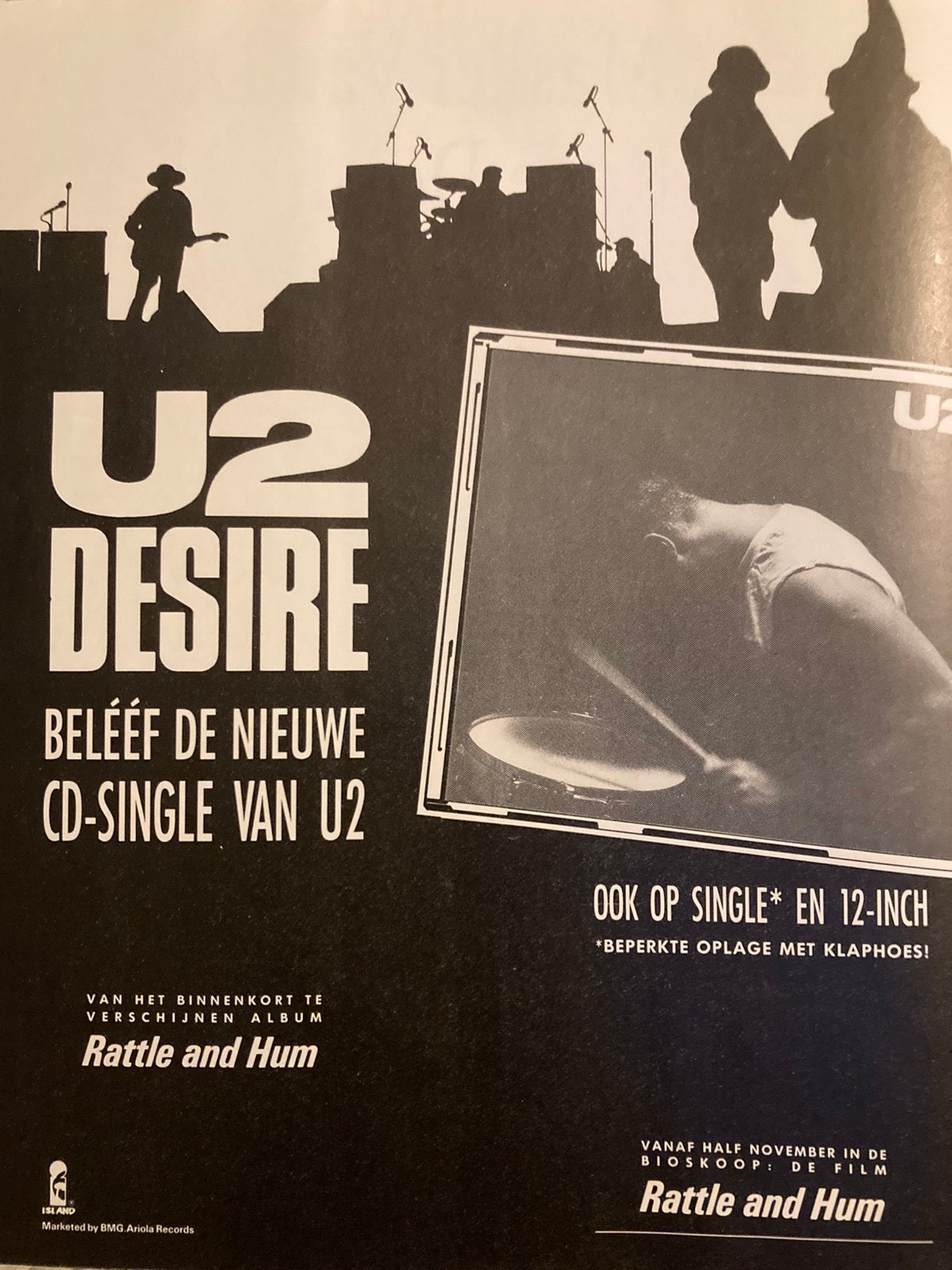 Paginagrote A4 advertentie U2 Desire release, Ophalen of Verzenden, Zo goed als nieuw, A4 of kleiner, Film en Tv