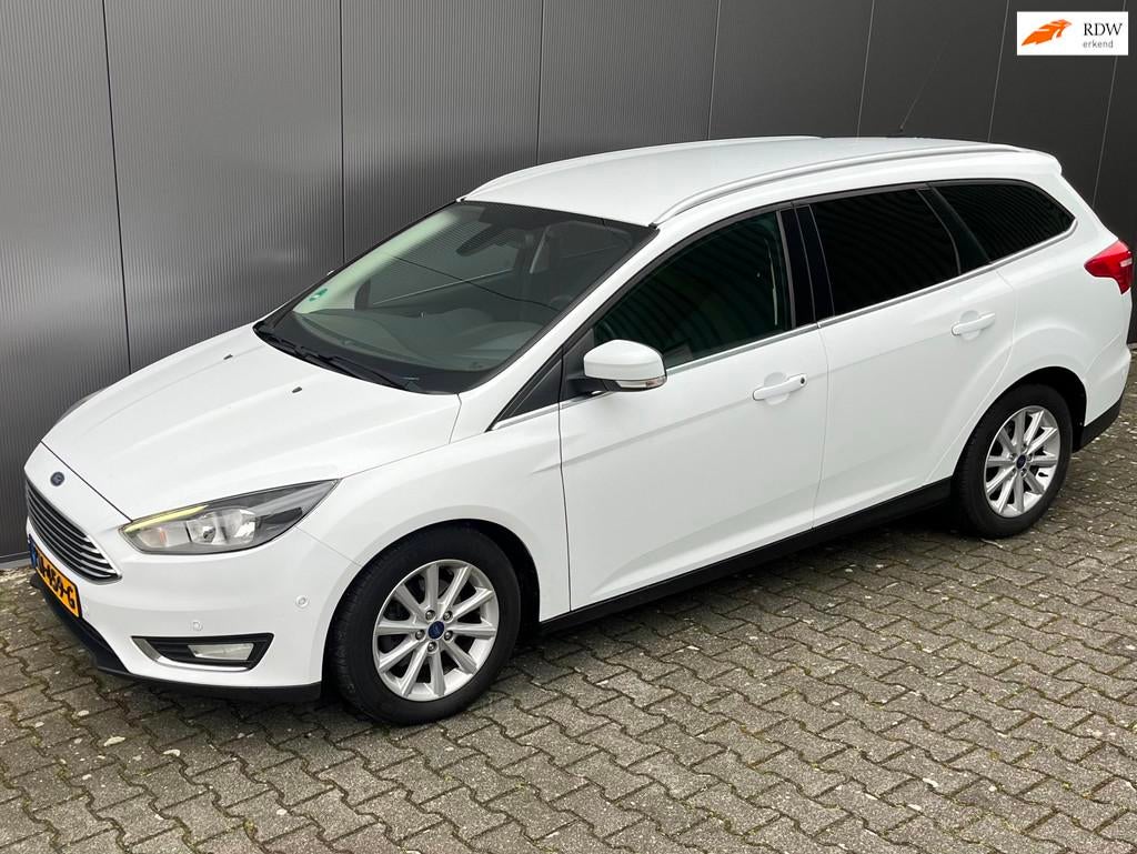 Ford Focus Wagon 125 pk Titanium nieuwe APK garantie, Auto's, Gebruikt, Euro 6, Wit, Handgeschakeld