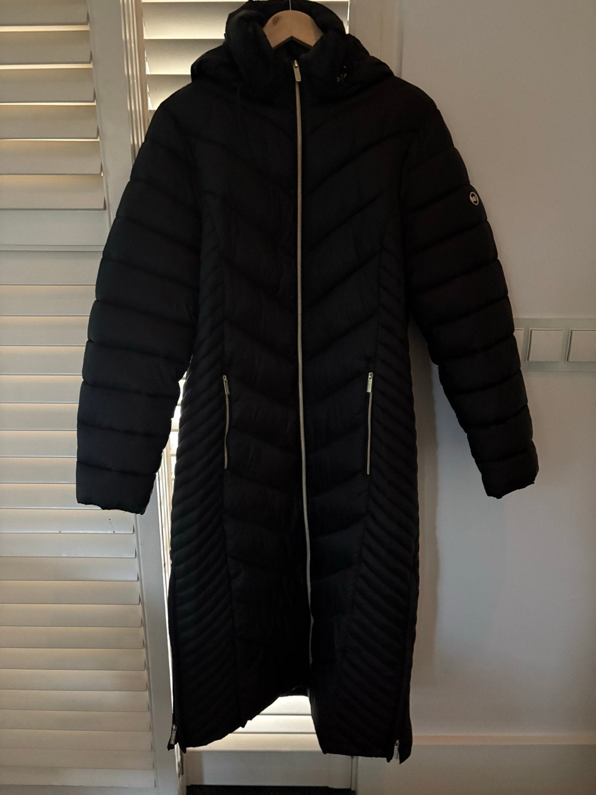 Michael Kors lange puffer jas met capuchon - Maat L, Ophalen of Verzenden, Zo goed als nieuw, Maat 42/44 (L), Zwart