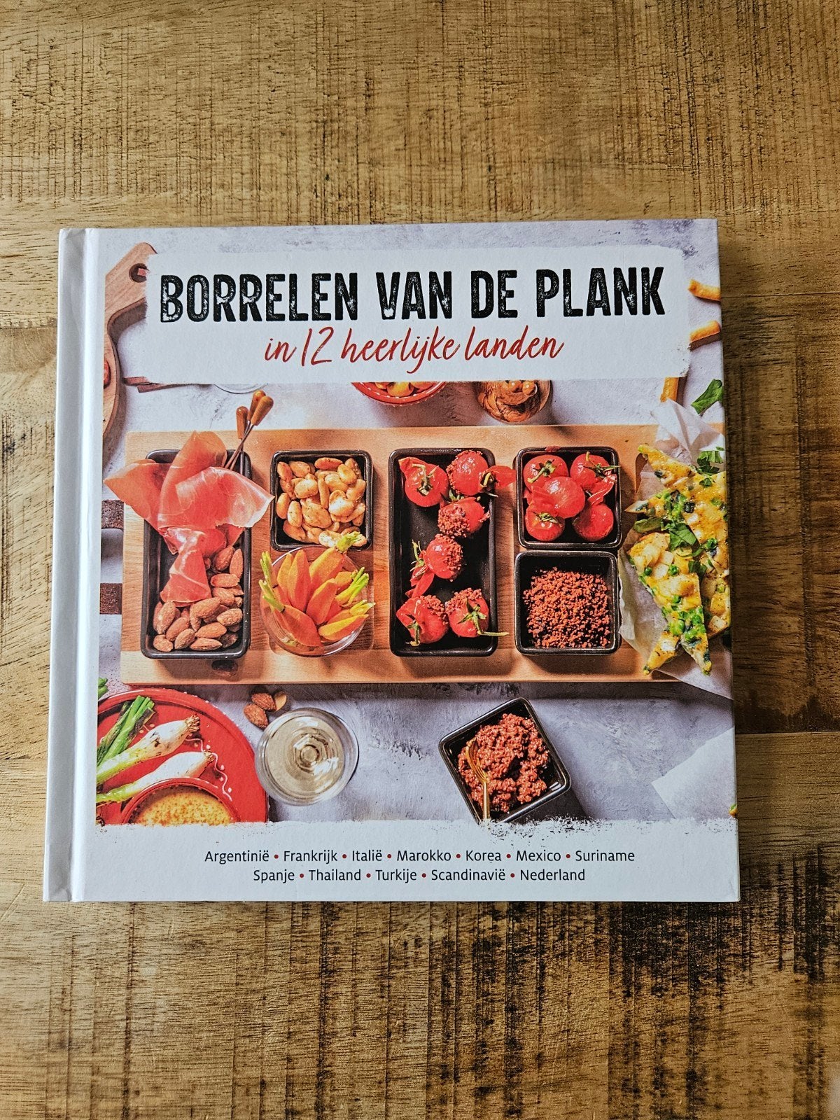 Borrelen van de Plank: 12 heerlijke landen, Ophalen of Verzenden, Zo goed als nieuw, Overige gebieden, Tapas, Hapjes en Dim Sum