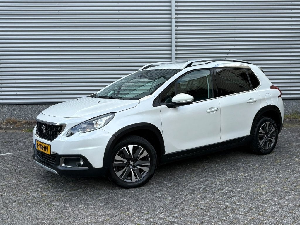 Peugeot 2008 1.2 PureTech Allure Distributie V.V AUTOMAAT Xe, Auto's, Automaat, 1199 cc, 1165 kg, Leder en Stof