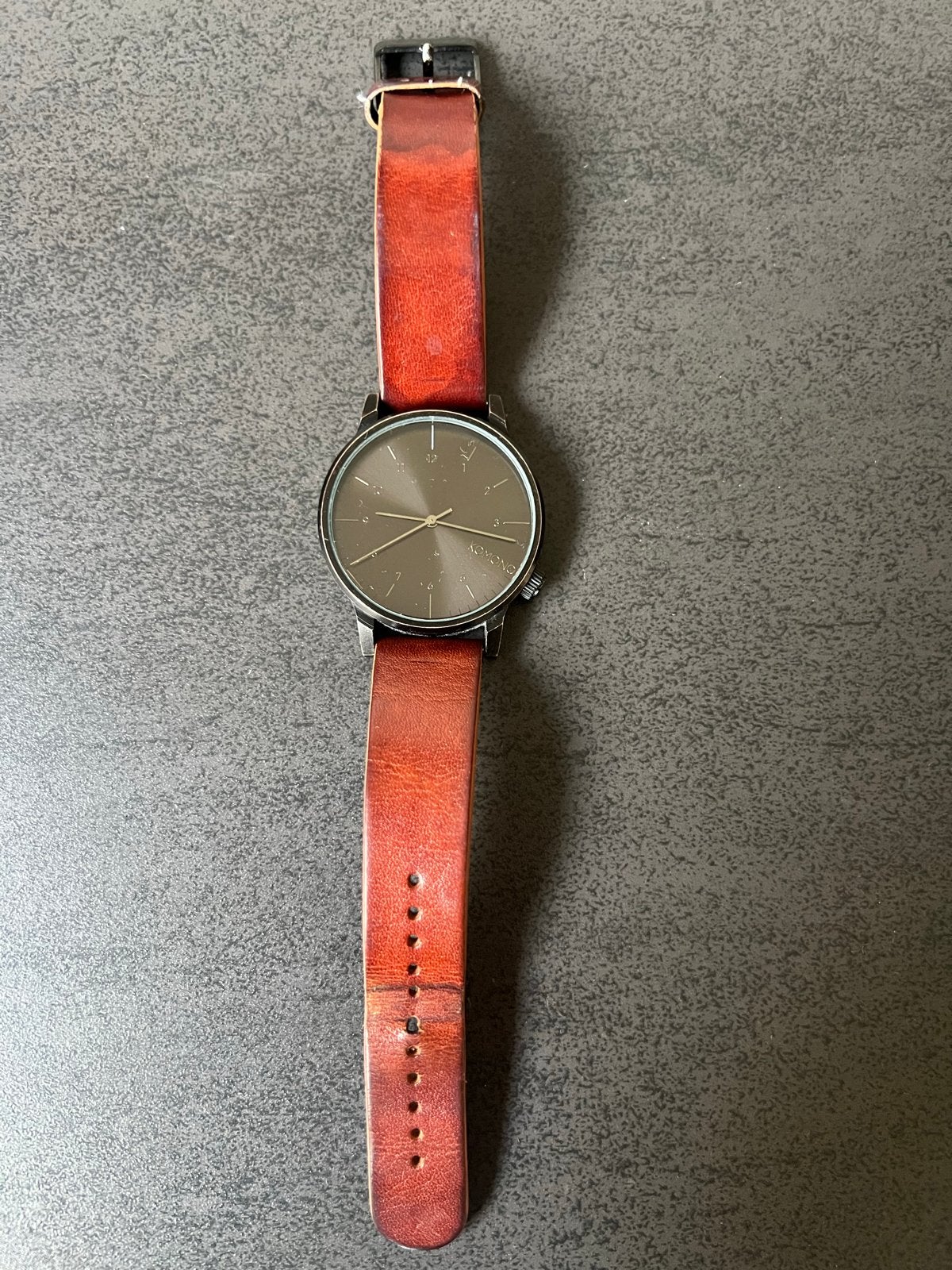 Komono horloge met leren bandje - Gebruikt, Overige merken, Polshorloge, Ophalen of Verzenden, Leer