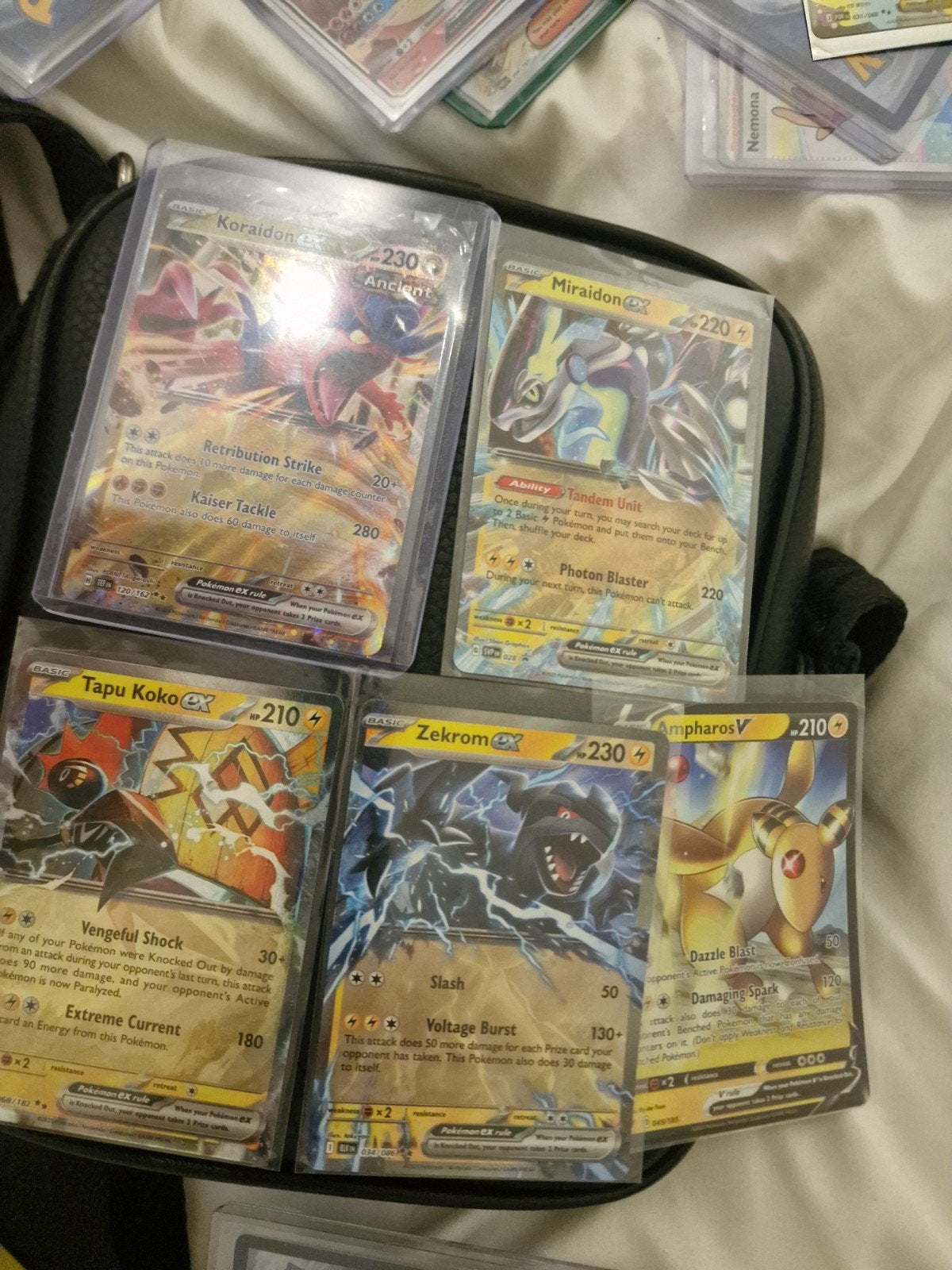 Pokémon kaarten: Koraidon, Miraidon,Tapu Koko, Zekrom, Ampha, Ophalen of Verzenden, Zo goed als nieuw, Meerdere kaarten