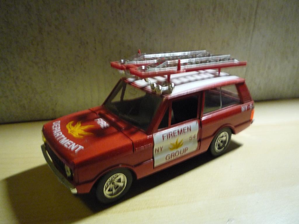 Range Rover NY Firemen Group Brandweerwagen Burago 1:24, Ophalen of Verzenden, Gebruikt, Auto, Bburago