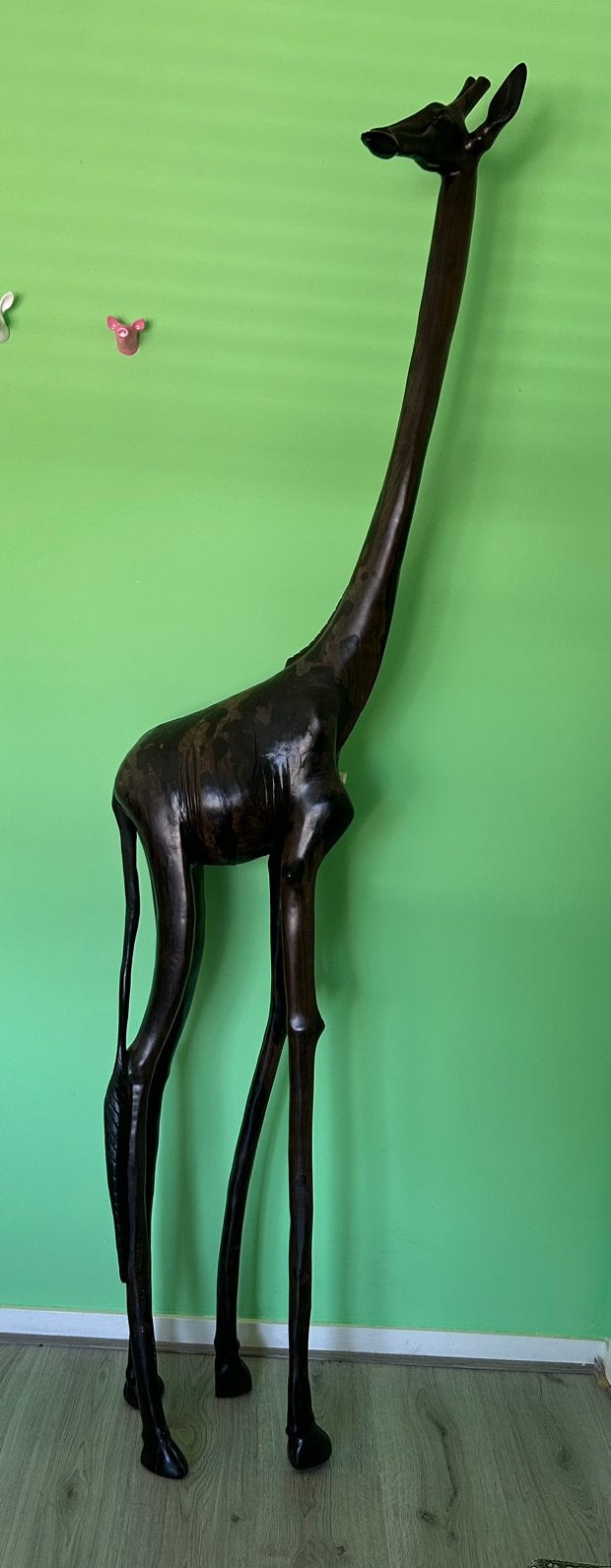 Giraffe van hout, Ophalen