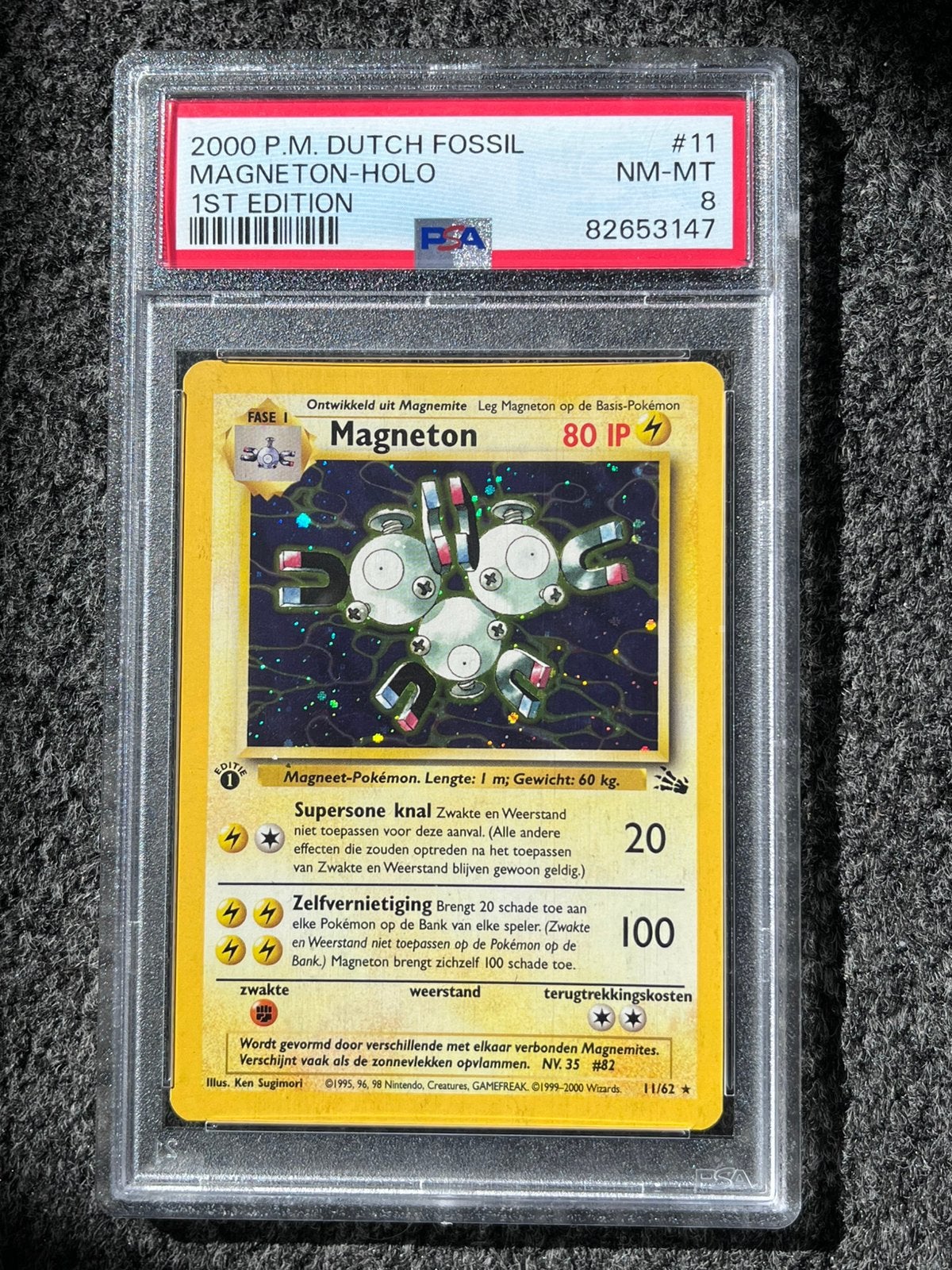 Pokémon PSA 8 Dutch 1st Ed. Magneton #11 Fossil (POP 7!), Ophalen of Verzenden, Zo goed als nieuw, Losse kaart, Foil