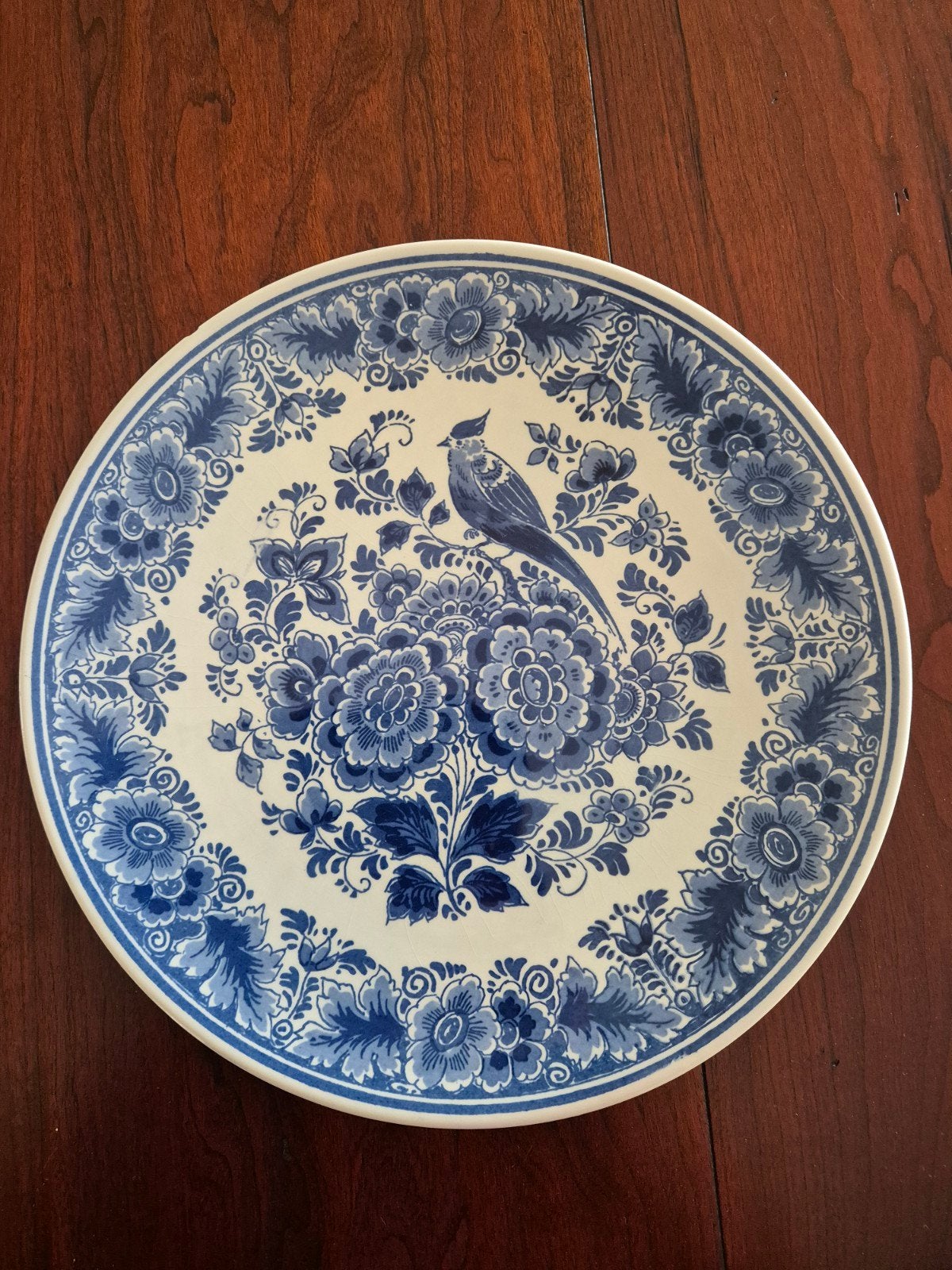 Delfts Blauw wandbord met vogel en bloemen, handgeschilderd, Ophalen of Verzenden