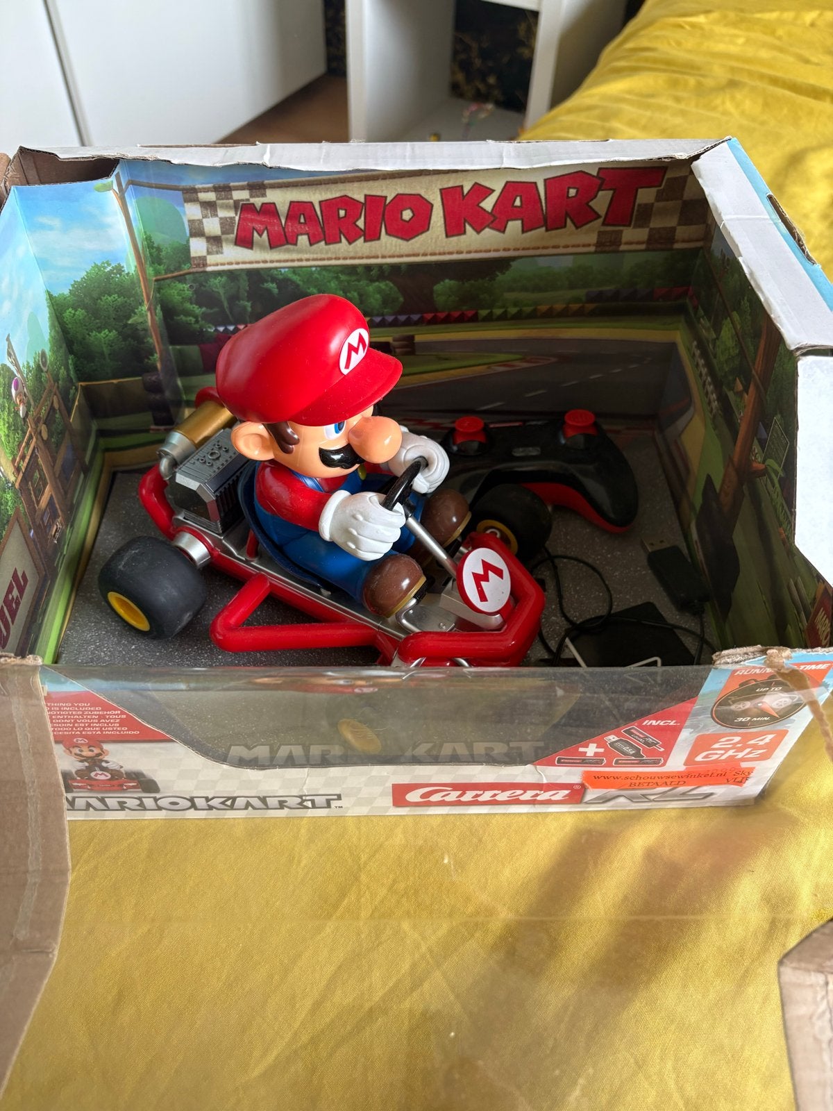 Mario Kart Carrera RC - Mario (Zo goed als nieuw), Elektro, Ophalen of Verzenden, Zo goed als nieuw, Auto onroad