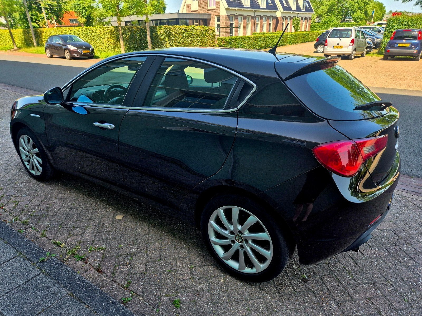 Alfa Romeo Giulietta 1.4 Turbo  2010 Zwart nap airco cruise, Auto's, Voorwielaandrijving, Stof, Zwart, 4 cilinders