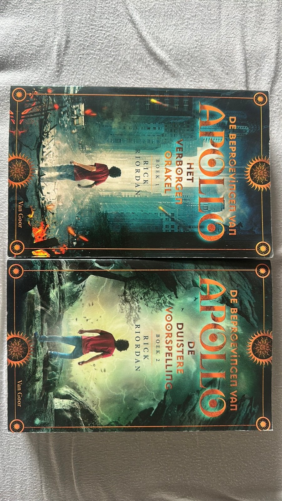 De beproevingen van Apollo (Rick Riordan) boek 1 en 2, Boeken, Ophalen of Verzenden, Zo goed als nieuw