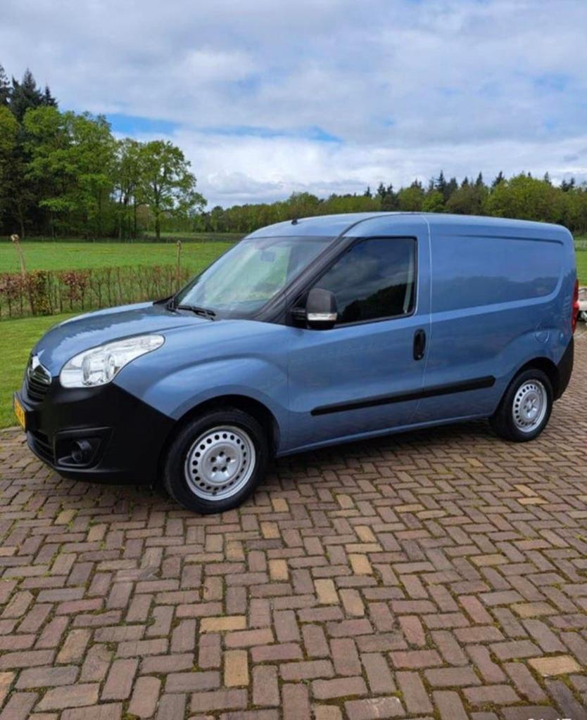 Opel Combo 1.4 70KW 2013, Auto's, Bestelauto's, Particulier, Bluetooth, Centrale vergrendeling, Schuifdeur, Trekhaak, Opel, Benzine