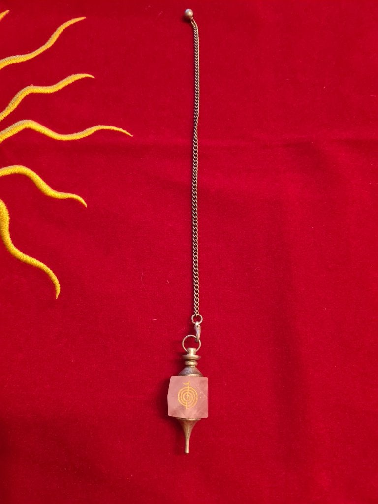 Rozenkwarts pendel met Reiki symbool, Boeken, Ophalen of Verzenden, Zo goed als nieuw, Spiritualiteit algemeen, Overige typen