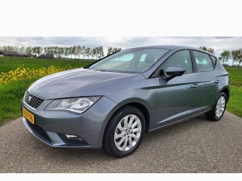 Seat Leon 1.2 TSI 77KW/105PK 2013 Grijs *goed onderhouden*, Auto's, Voorwielaandrijving, Euro 5, Stof, Zwart