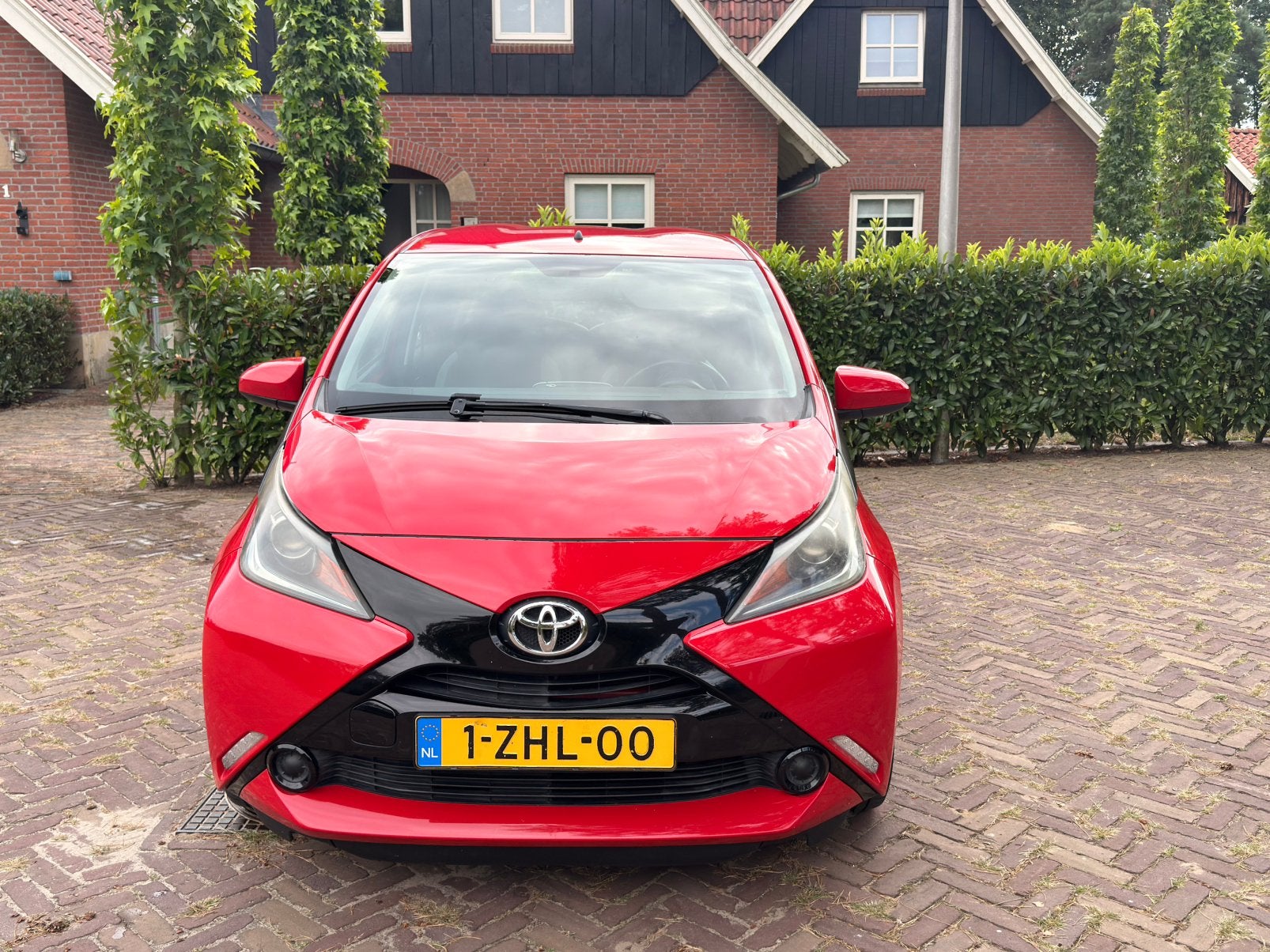 Toyota Aygo 1.0 12V Vvt-i Ddrs 2015 Rood. Lage km-stand., Voorwielaandrijving, 4 stoelen, Origineel Nederlands, Handgeschakeld