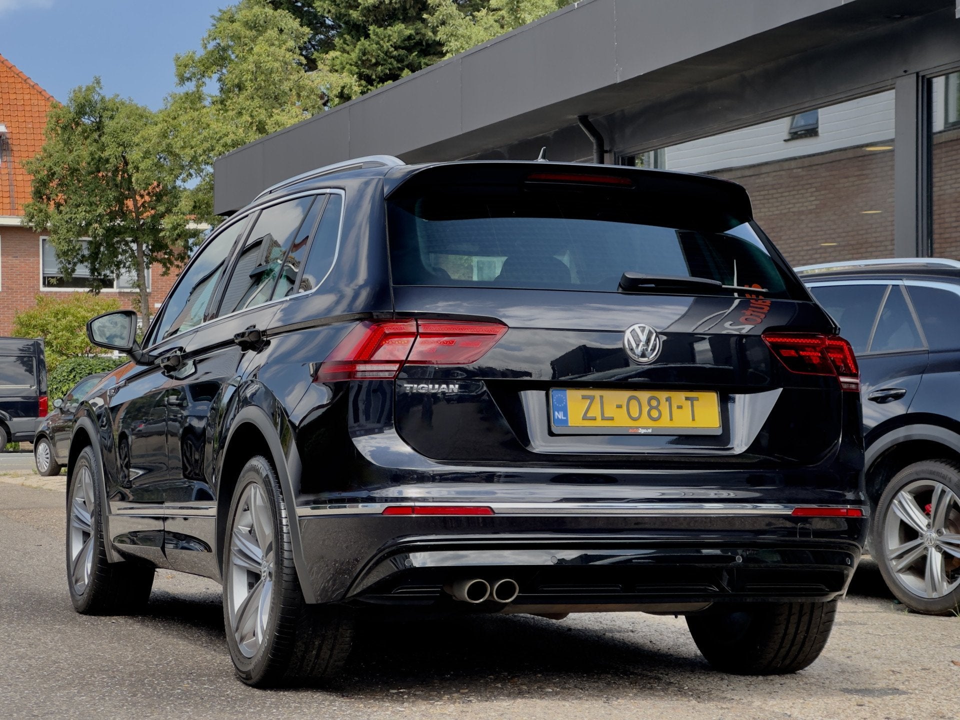 Volkswagen Tiguan 1.5 TSI AUT7 2X R-LINE DESIGNO-INT NAVI DI, Auto's, Gebruikt, Euro 6, 150 pk, Alcantara