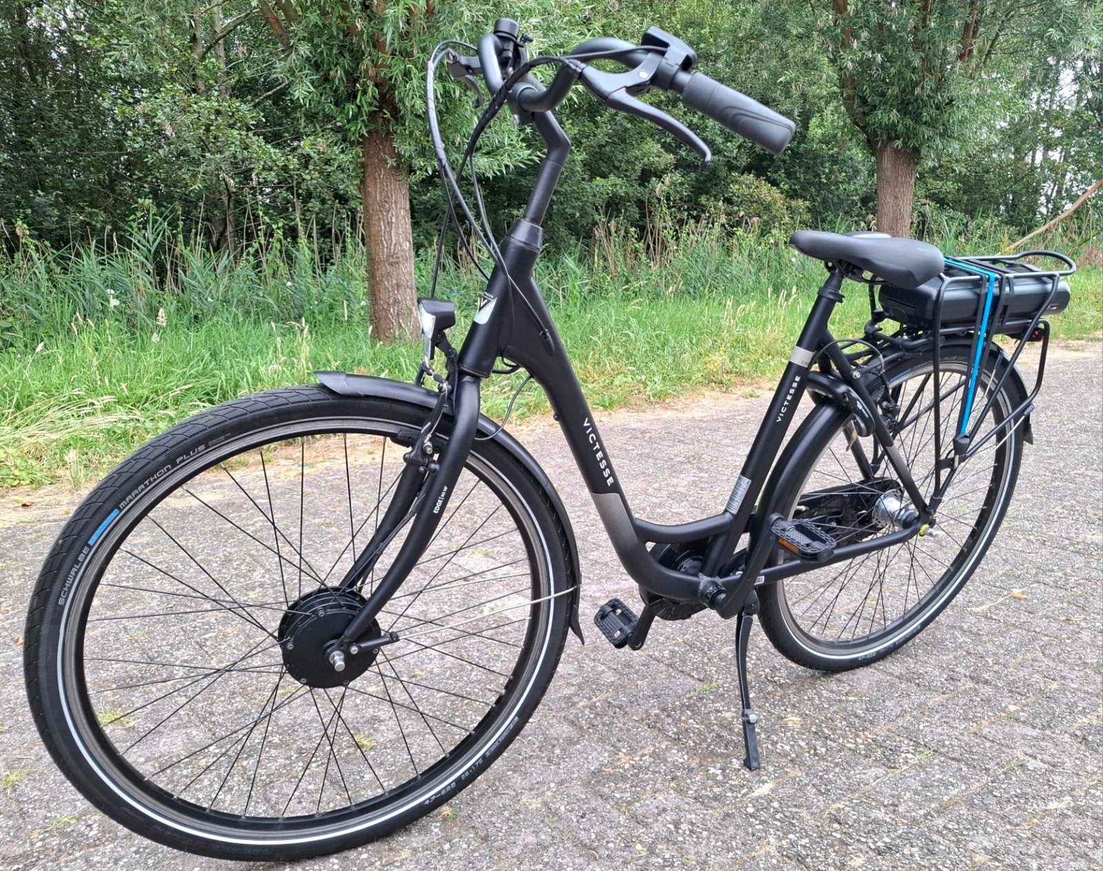 Foto 4 van Hippe mat zwarte elektrische damesfiets, 28inch, 56cm hoog✅️