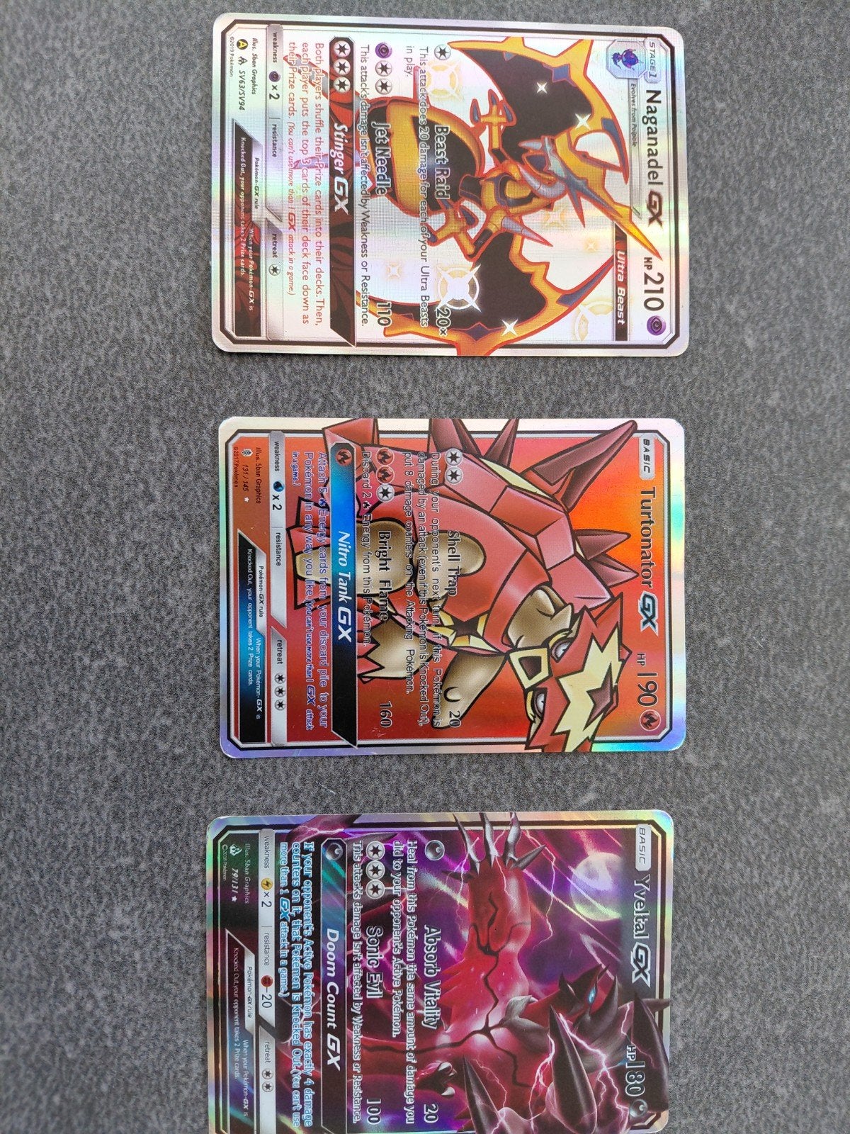 Pokémon GX Kaarten: Naganadel, Turtonator, Yveltal, Ophalen of Verzenden, Gebruikt, Meerdere kaarten, Foil