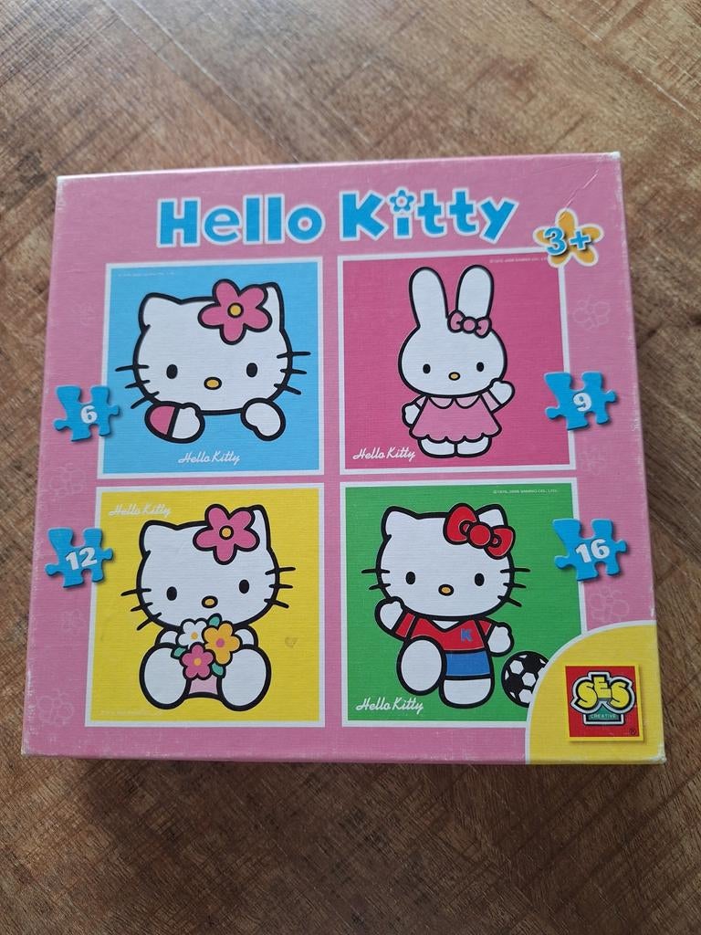 4 Hello Kitty puzzels in doos., Ophalen of Verzenden, Gebruikt