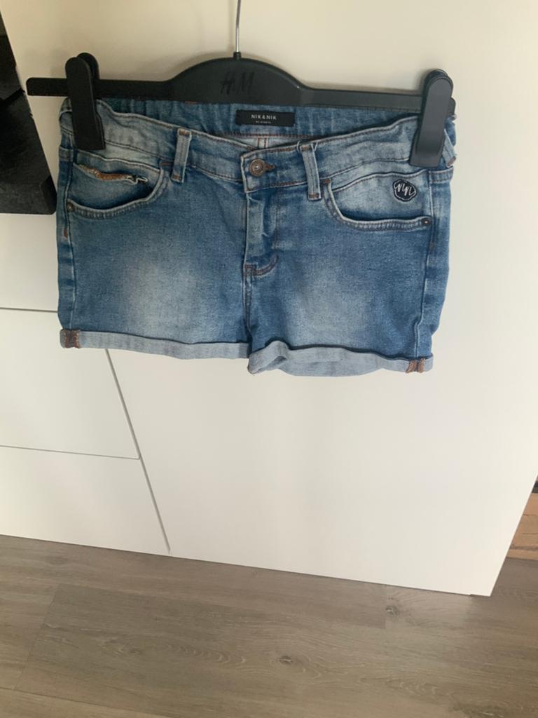 Kort spijkerbroekje van NIK NIK mt 16 heel klein prijsje, Kinderen en Baby's, Kinderkleding | Maat 176, Ophalen, Gebruikt, Meisje