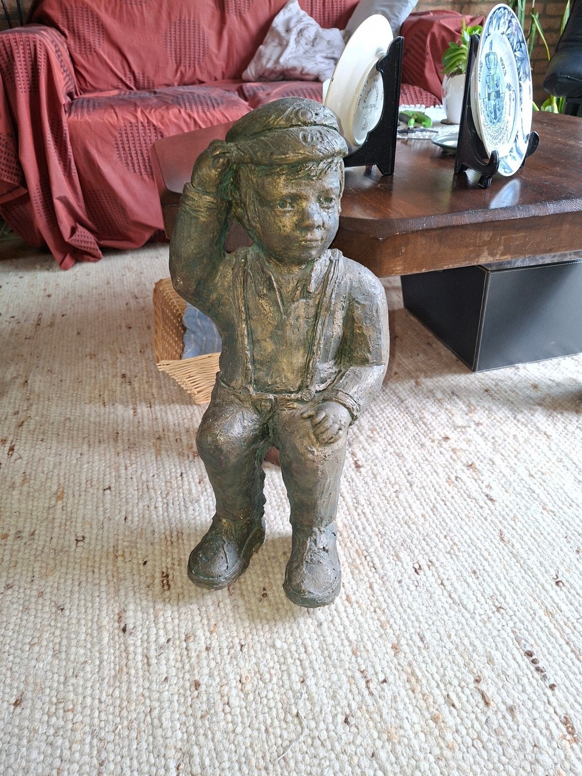 Betonnen beeldje van jongetje uit ca. 1900, Ophalen
