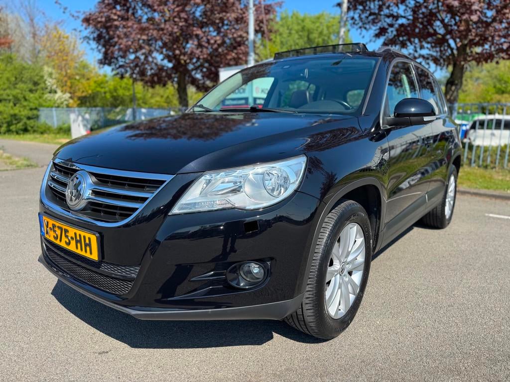Volkswagen Tiguan 1.4 TSI Trend&Fun 4Motion Leder Panorama C, Auto's, Gebruikt, Zwart, 4 cilinders, Zwart