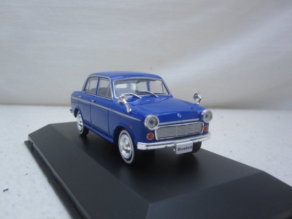 Datsun Bluebird 310 1959 1:43 First43, Hobby en Vrije tijd, Modelauto's | 1:43, Ophalen of Verzenden, Nieuw, Auto, Overige merken